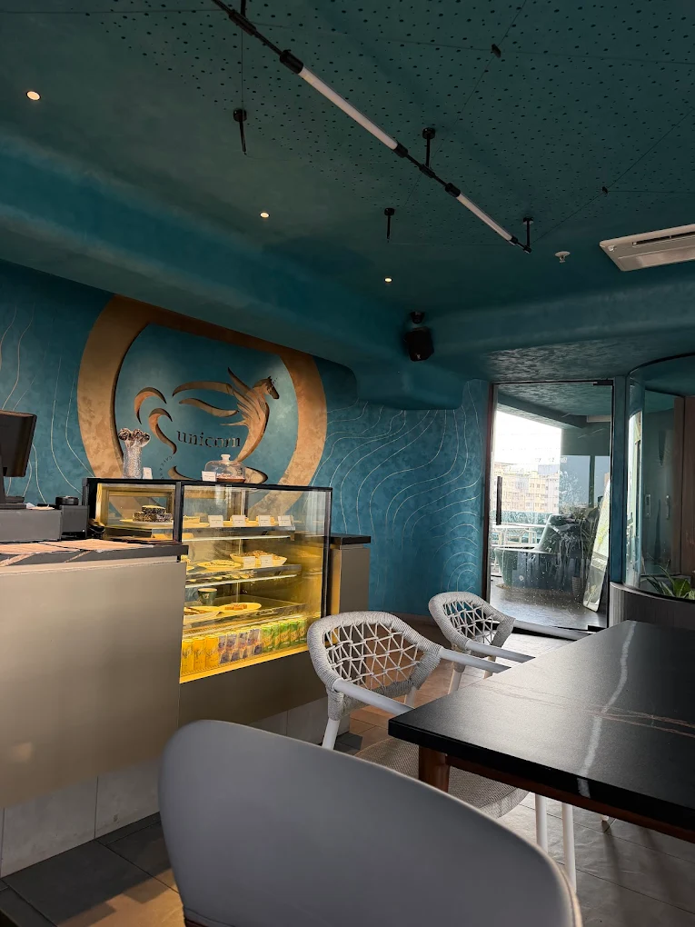 UNICORN CAFE AND RESTRO logo