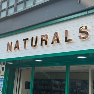 Naturals Cosmetic Store logo