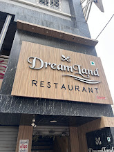 DreamLand Restaurant logo