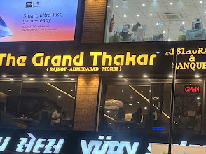 The Grand Thakar logo