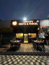 Uncle’s Resto & Parcel logo
