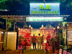 Sk Restaurant logo