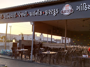 The Grand Khodiyar Restaurant / Best Restaurant in Rajkot logo