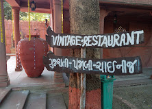 The Vintage Village Restaurant logo