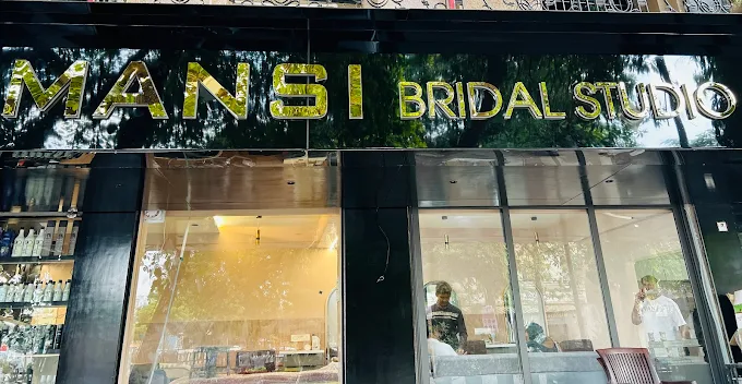Mansi Salon logo