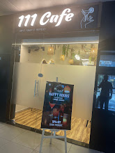 111 cafe varachha