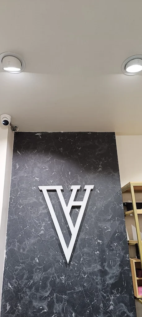 VAN HEUSEN logo
