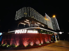 Pooja Parlour kathiyawadi restaurant logo