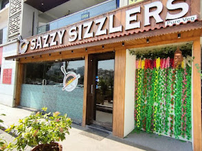 Sazzy Sizzlers (Pure-Veg) logo