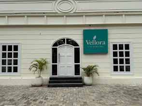 VELLORA CAFE & RESTRO logo